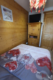 Chambre Tv et rangement