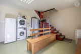 Local à skis / buanderie en rez-de-jardin du chalet